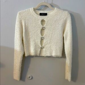 AKIRA cream cropped sweater with heart accents (M)